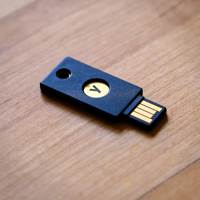 a wooden usb stick sitting on top of a wooden table
